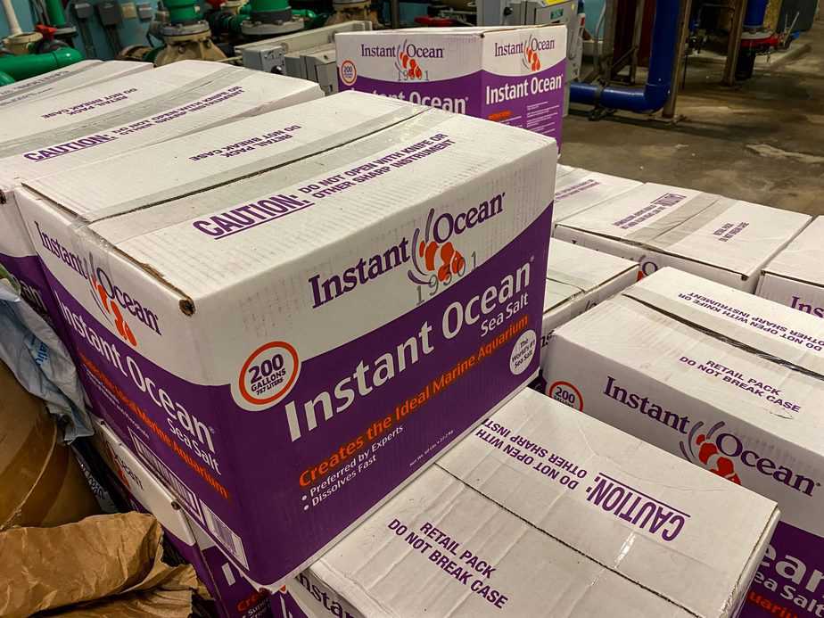 Stacks of boxes of Instant Ocean a sea salt water treatment product that when added to water it provides the water with the salinity of the ocean