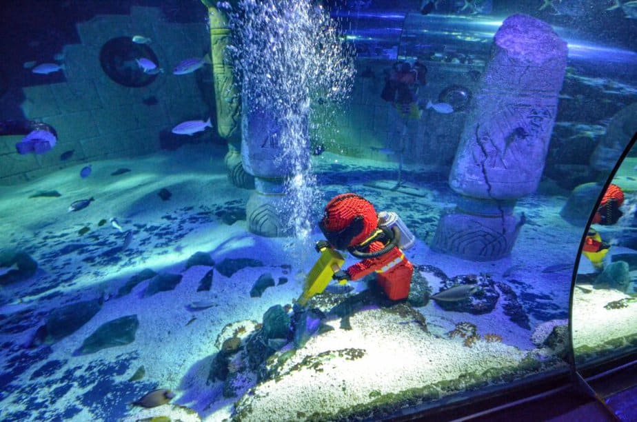 lego figure inside aquarium