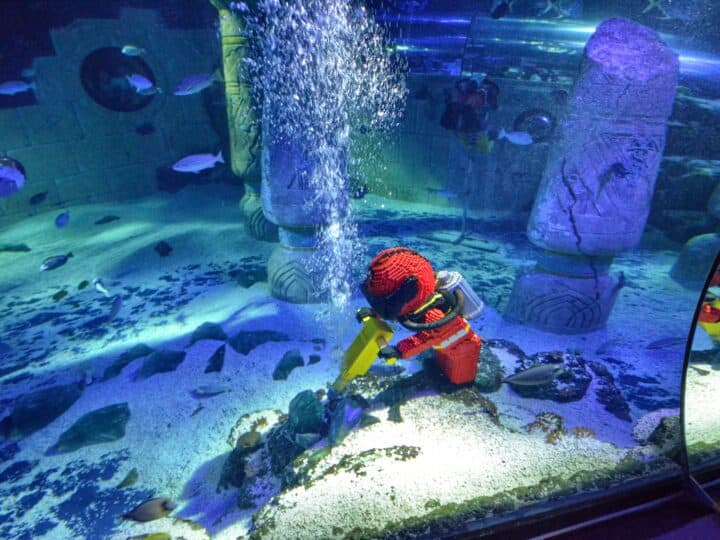 lego figure inside aquarium